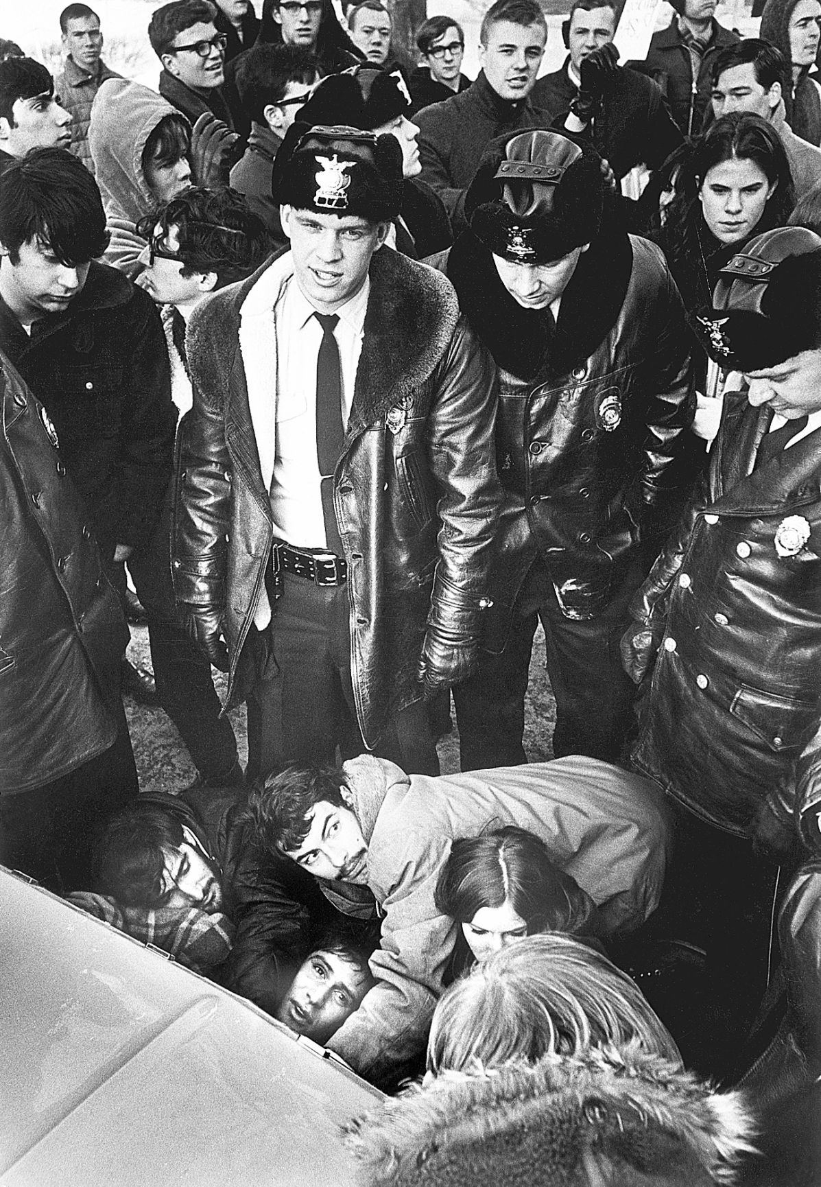 Protesters interact with police